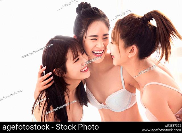 Happy close female friends