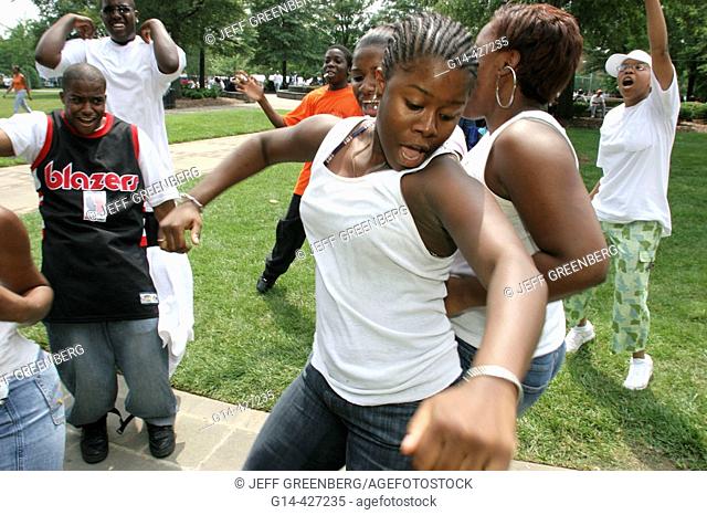 Juneteenth Celebration, Kelly Ingram Park, Black female teens, dancing. Birmingham, Alabama. USA