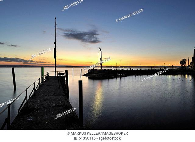 View from the pier over the harbour and the guidance statue after sunset, Lake Constance district, Baden-Wuerttemberg, Germany, Europe