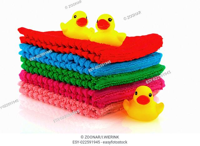Folded towels with little ducks