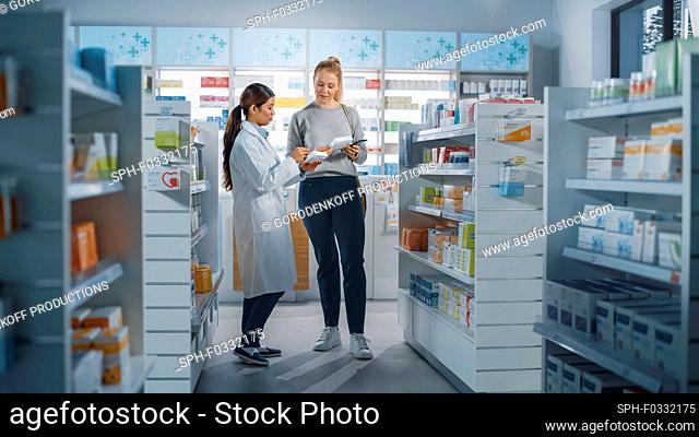 Customer choosing medication to buy in a pharmacy