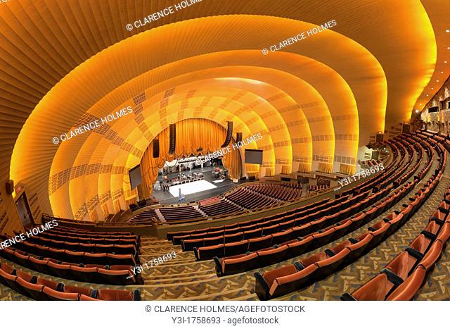 The view of the stage from the balcony as workers prepare for a show in historic Radio City Music Hall in New York City, New York, USA