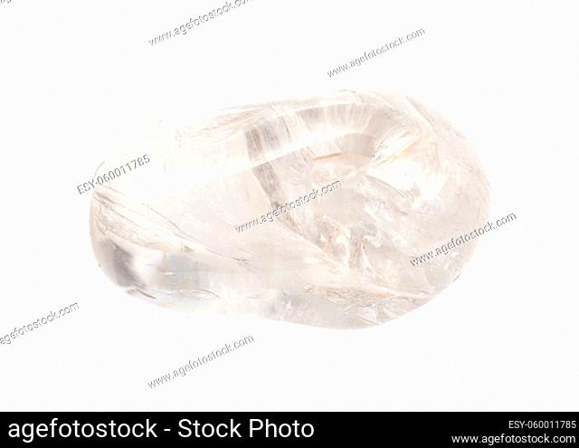 closeup of sample of natural mineral from geological collection - rolled colorless Rock crystal gem stone isolated on white background