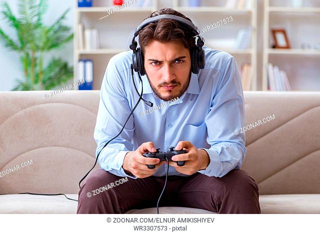 Student gamer playing games at home