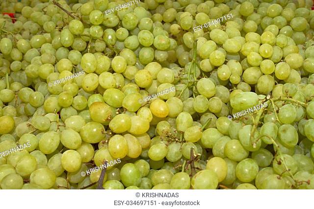 A grape is a fruiting berry of the deciduous woody vines of the botanical genus Vitis. Grapes can be eaten raw or they can be used for making wine, jam, juice