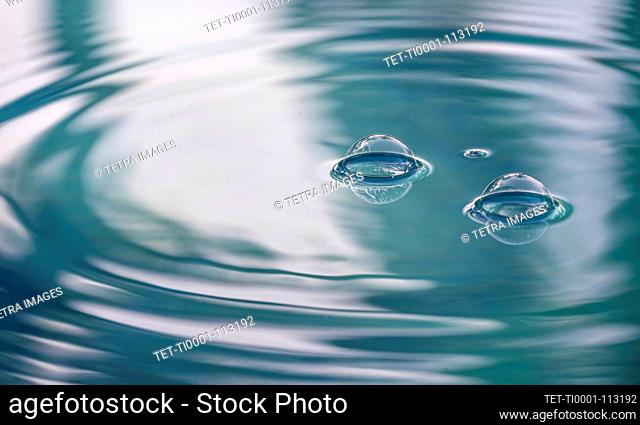 Air bubbles on water surface