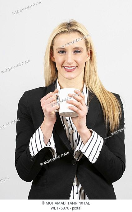 Business woman drinking coffee
