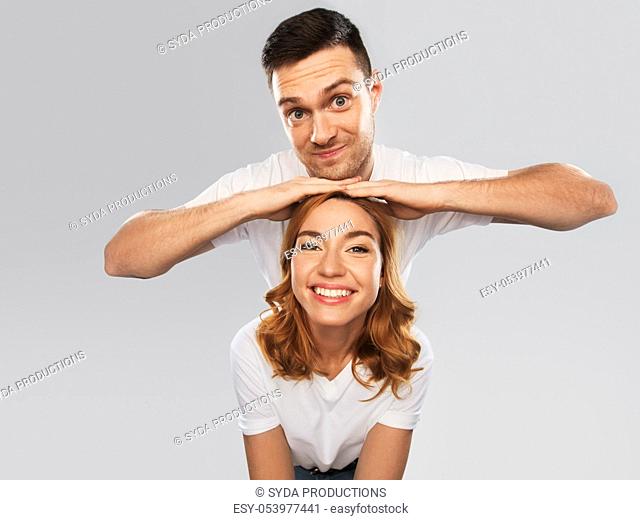 portrait of happy couple in white t-shirts