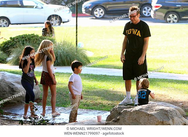 Tom Arnold and Breckin Meyer bump into each other at a park in Los Angeles. Featuring: Tom Arnold Where: Los Angeles, California