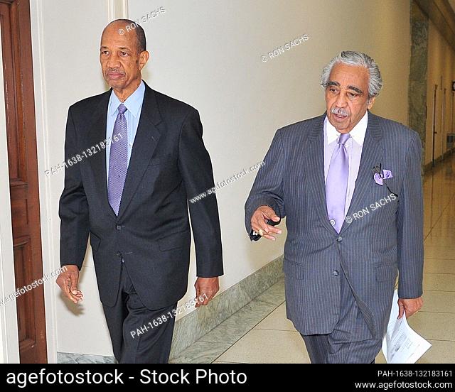 United States Representative Charlie Rangel (Democrat of New York) talks with his Chief of Staff, George Henry, as he departs from his Capitol Hill office on...