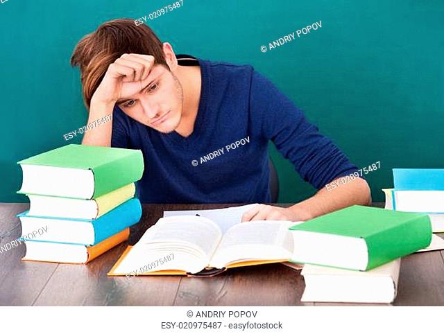 Tired Young Man Studying