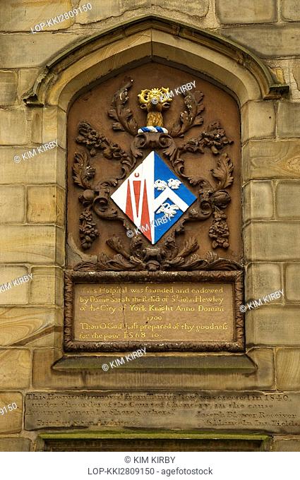 England, North Yorkshire, York, Coat of arms on Lady Hewley's Almshouses in St Saviourgate