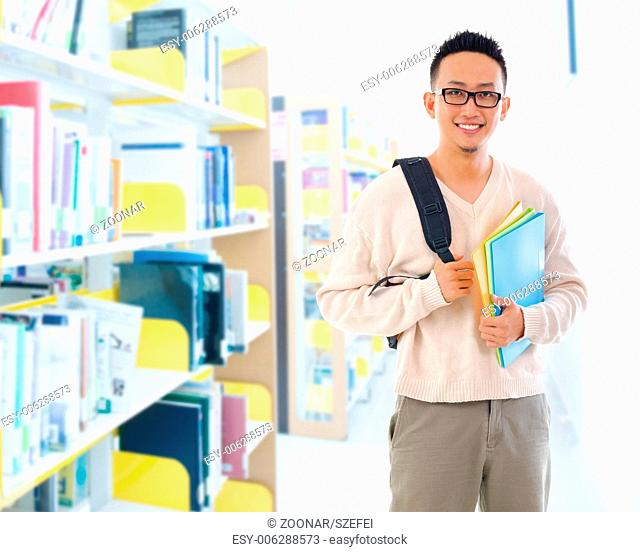 Southeast Asian adult student in library