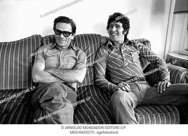Italian director and writer Pier Paolo Pasolini posing with Italian actor Ninetto Davoli (Giovanni Davoli). Cannes, 1970