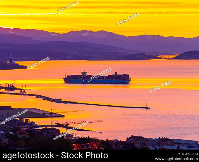 Dawn scenery MAERSK ship enters harbor Rijeka in Croatia Europe