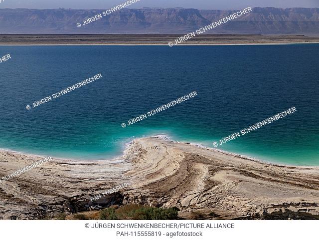 The Dead Sea shimmers in rich blue, green and turquoise tones on its eastern shore, the Jordanian side. The water is said to have a healing effect on diseases...
