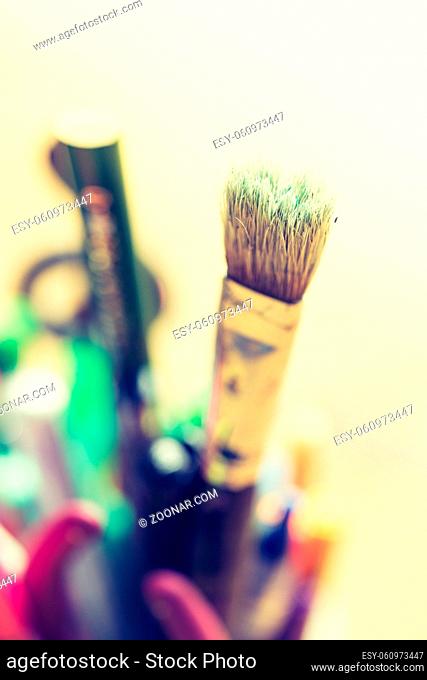 Artist paint brush on creative background. Painting therapy