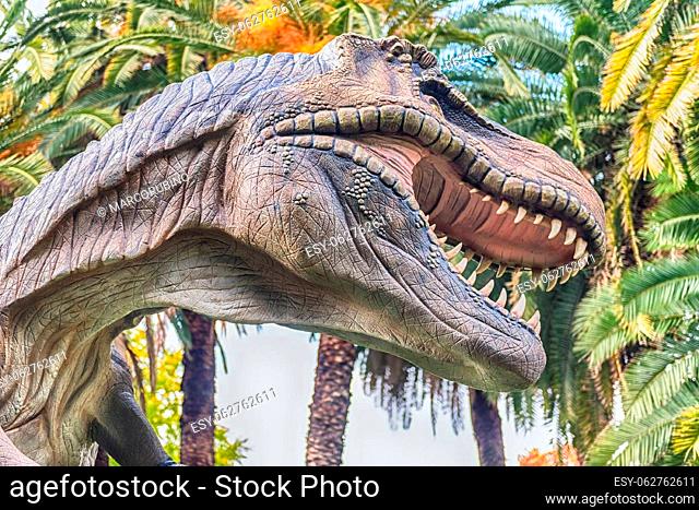 ROME - NOVEMBER 21, 2021: Dinosaurs featured in the exhibition ""Empire of the Dinosaurs"", held ininside the historical Botanical Garden of Rome, Italy
