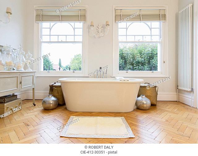 Home showcase interior bathtub and parquet floor