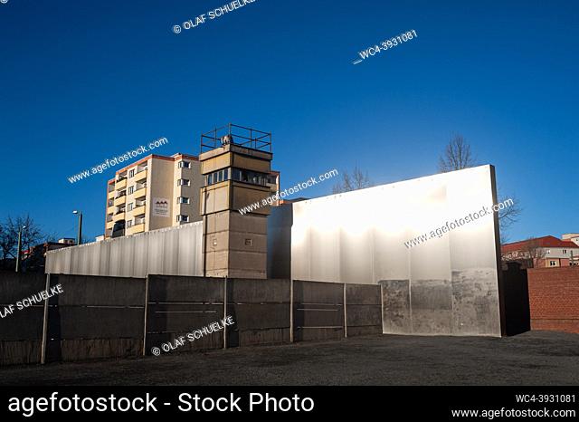 Berlin, Germany, Europe - The monument of the Berlin Wall Memorial with watchtower, concrete wall segments and a stell wall along Bernauer Strasse in Mitte...