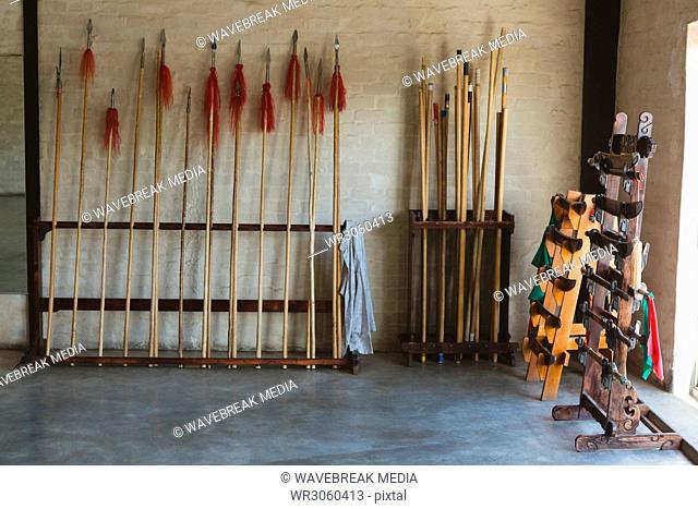 Long pole and swords arranged on rack