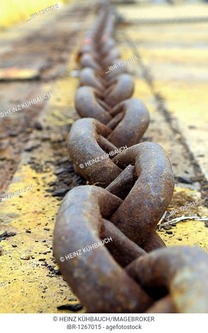 Thick iron chain lies on the ground, port, Cagliari, Sardinia, Italy, Europe