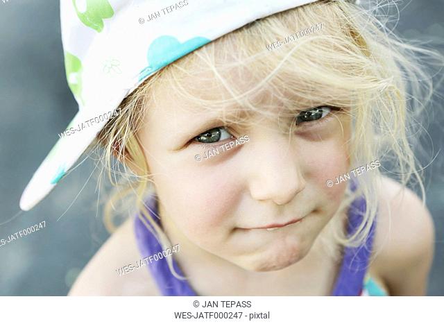 Germany, North Rhine Westphalia, Cologne, Portrait of girl with cap, close up