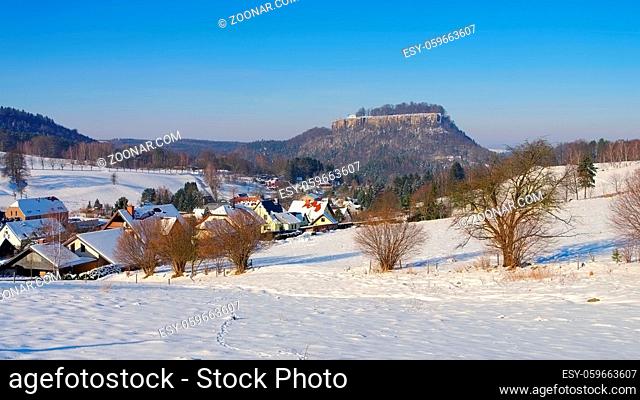 Koenigstein im Winter - Castle Koenigstein in Elbe sandstone mountains in winter