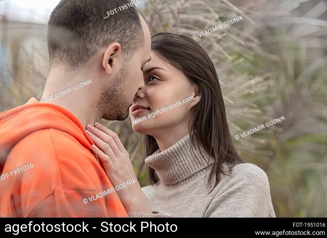 Sensual, affectionate young couple kissing