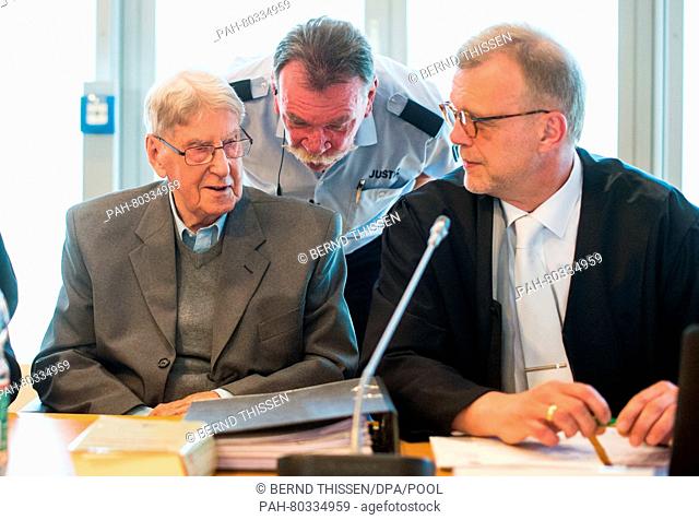 Defendant Reinhold Hanning (L) sits in the dock next to his lawyer Johannes Salmen (R) during another day of his trial in Detmold, Germany, 13 May 2016