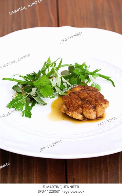 Pan Seared Sweetbreads with jus and a side of Field Greens