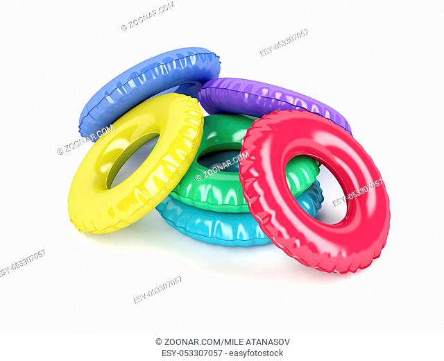 Swim rings with different colors on white background