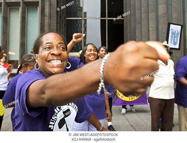 Detroit, Michigan - Members of the Service Employees International Union rally to protest the firing of janitors at a downtown building  Janitors who had worked...