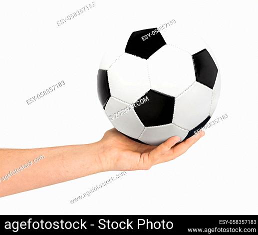 Hand and soccer ball isolated on white background