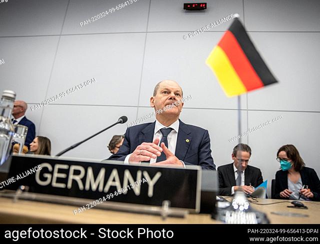 24 March 2022, Belgium, Brüssel: German Chancellor Olaf Scholz (SPD) is waiting for the start of the meeting of the G7 countries at NATO headquarters