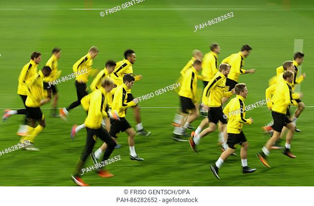 Dortmund players warm up during a training session prior to the UEFA Champions League group phase soccer match between Real Madrid and Borussia Dortmund in...