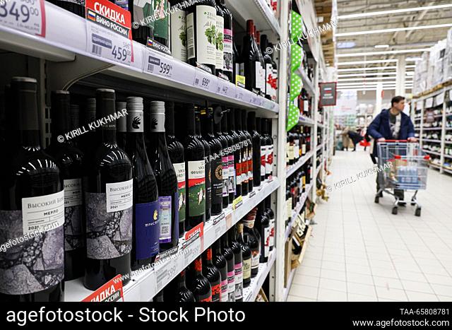 RUSSIA, NOVOSIBIRSK - DECEMBER 16, 2023: Wine is on sale in an Auchan hypermarket. Kirill Kukhmar/TASS