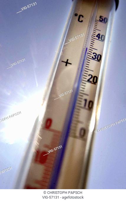 Thermometer showing more than 30 degrees celsius in the sun. - BONN, GERMANY, 25/06/2003