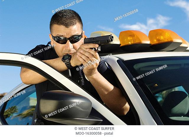 Police Officer Aiming Handgun