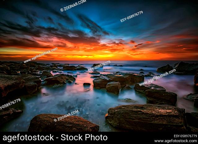 Magnificent sunrise view at the Black sea coast near Varna, Bulgaria. Blue hour