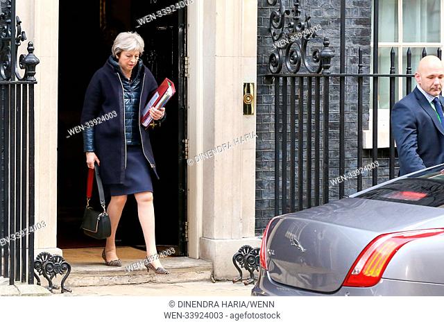 Britain's Prime Minister Theresa May leaves No. 10 Downing Street to attend the Prime Minister's Questions (PMQs) at the House of Commons Featuring: Theresa May...
