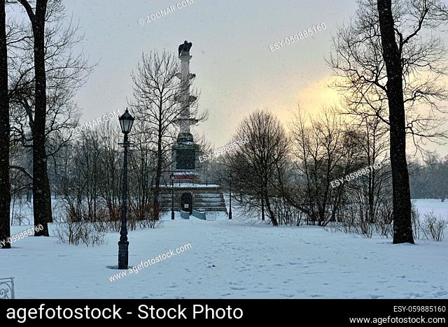 Winter landscape with Chesme Column and lake in Catherine garden, Pushkin, Russia