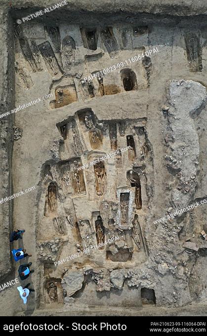 23 June 2021, Saxony-Anhalt, Eisleben: An uncovered church cemetery can be seen on the excavation site on the hill ""Kleiner Klaus"" above Helfta