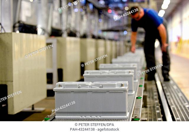 Batteries of the brand VARTA are photographed in the Johnson Controls plant in Hannover, Germany 09 October 2013. According to experts