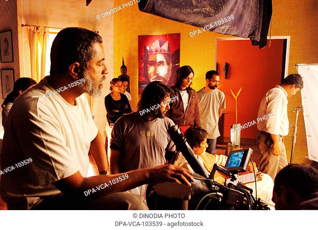 Director Rakesh Mehra shooting South Asian Indian Bollywood film star  Amitabh Bachchan for ad film in Mehboob studio ; Bombay Mumbai ; Maharashtra ; India