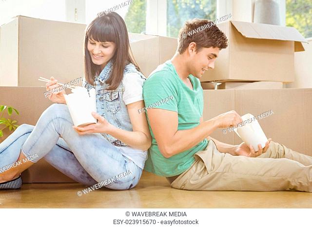 Young couple eating noodle