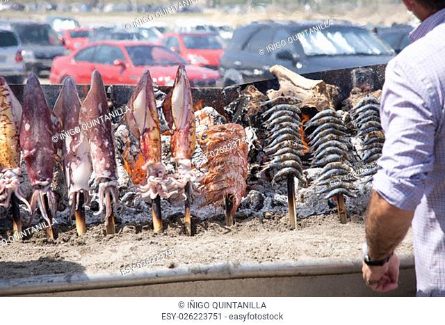 spanish typical fish espetos cooking in Malaga