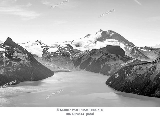 Black and white, Garibaldi Lake in front of mountain range with snow and glacier, Garibaldi Provincial Park, British Columbia, Canada