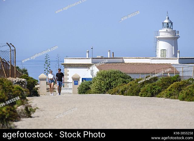 young couple on Cap Blanc lighthouse, Llucmajor, Mallorca, Balearic Islands, Spain