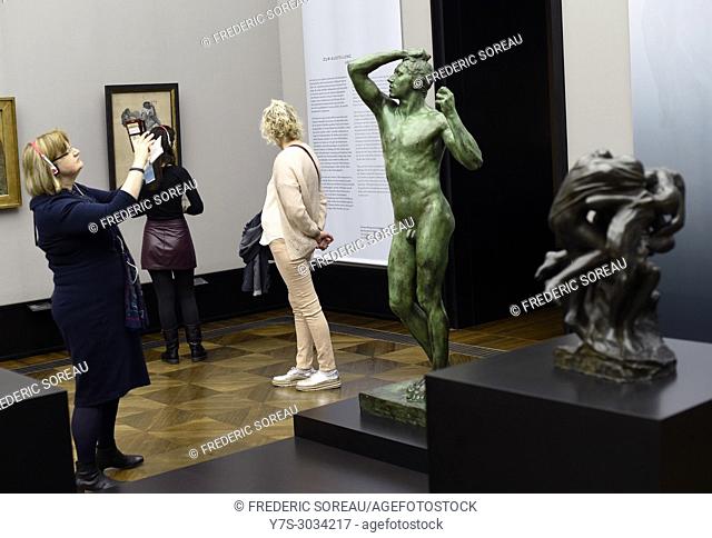 Visitors taking pictures of bronze sculpture of Rodin, Alte Nationalgalerie, Berlin, Germany